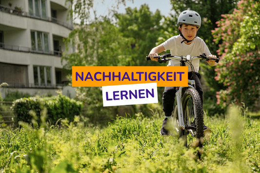 Junge auf Woom Mountainbike Kinderfahrrad