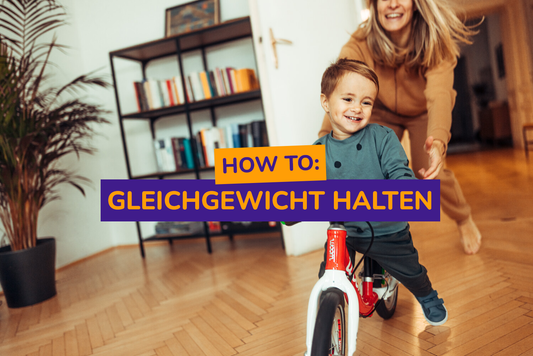 Kleinkind auf Woom Laufrad